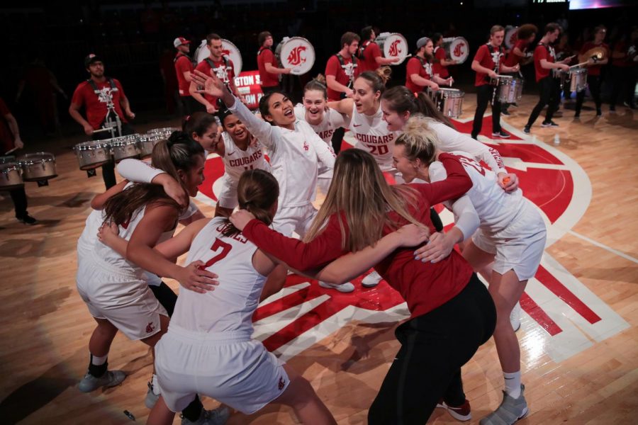 The+WSU+womens+basketball+team+huddles+up+before+the+game+against+University+of+Nebraska+on+Nov.+16+in+Beasley+Coliseum.+The+Cougars+picked+up+their+first+road+win+of+the+season+against+Jacksonville+State+University+on+Saturday.