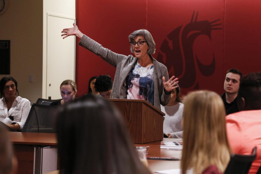 Jamie Nolan, associate vice president for Community, Equity and Inclusive Excellence,
goes over her activities and involvement since arriving at WSU on Wednesday in the CUB.