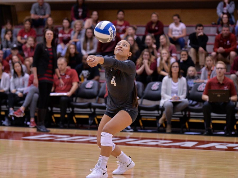 Junior libero Alexis Dirige hits the ball in the game against the the University of California, Los Angeles on Sunday in Bohler Gym.