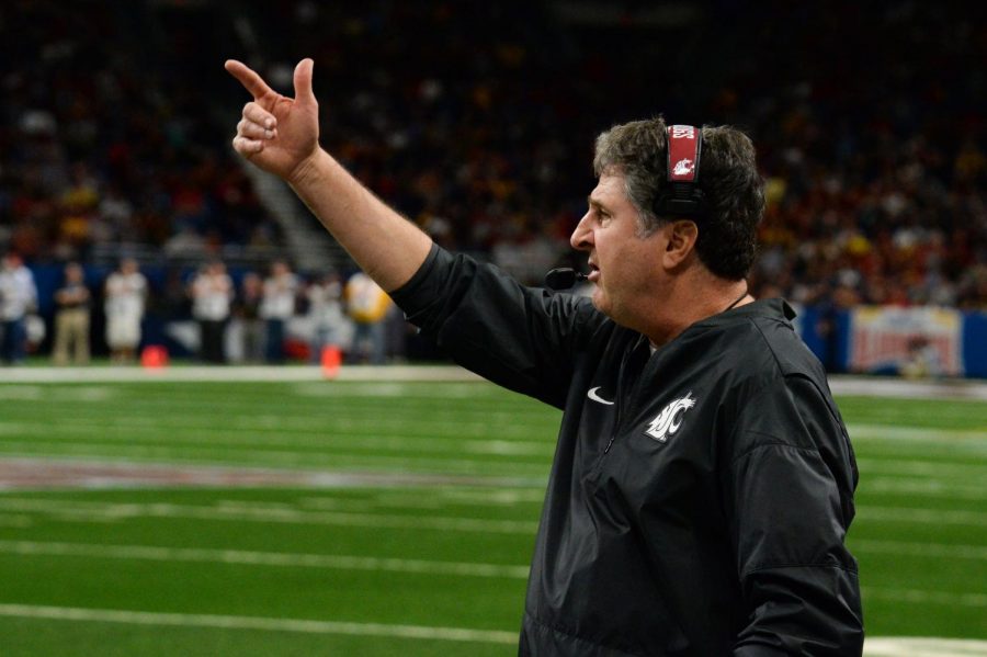 WSU Head Coach Mike Leach signals from the sidelines during the Alamo Bowl on Dec. 28 in San Antonio.
