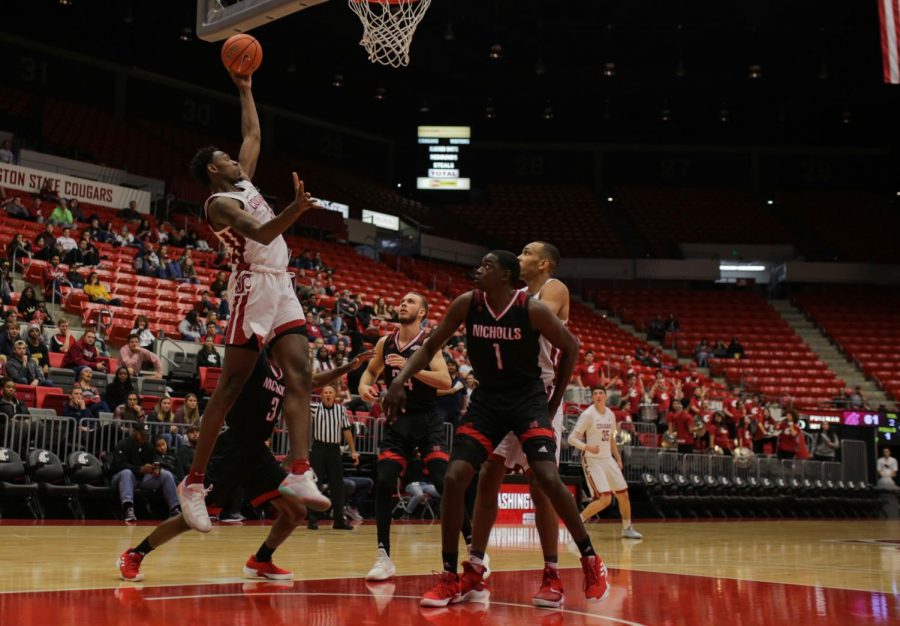 Senior forward Robert Franks jumps for a dunk in the home victory against Nicholls State on Nov. 11 at Beasley Coliseum.