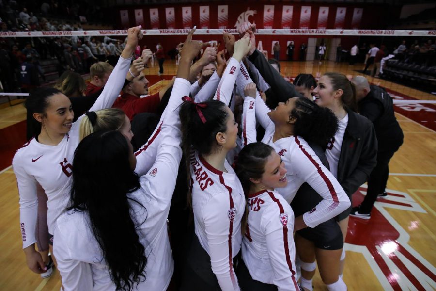 WSU+volleyball+celebrates+its+win+over+Northern+Arizona+on+Friday+at+Bohler+Gym.