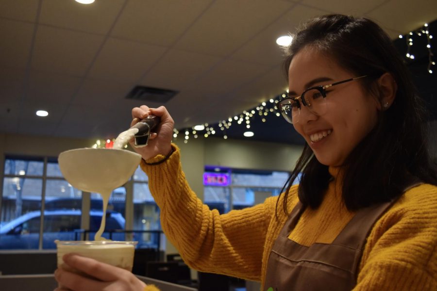 Employee Leah Chong makes popular bubble tea for customers using tea leaves Thursday evening at RealiTea in downtown Pullman.
