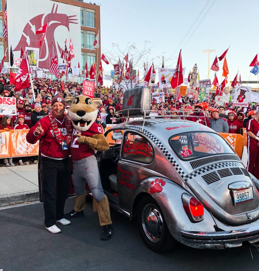 Bob poises with Butch in front of the Cougar Beetle at College GameDay on Oct. 20.