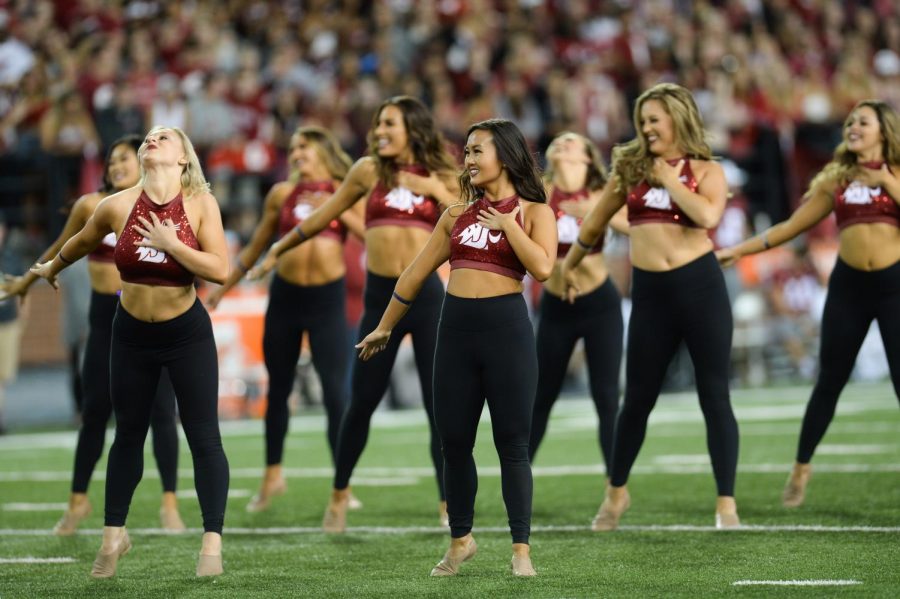 WSU Crimson Girls dance on the field Sept. 8 at the football game against San Jose State in Martin Stadium.