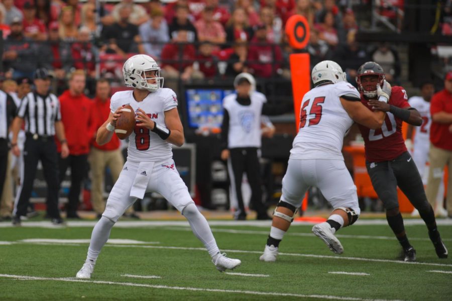 Eastern+Washington+redshirt+senior+quarterback+Gage+Gubrud+looks+for+an+open+receiver+downfield+during+a+game+between+WSU+and+EWU+on+Sept.+15+at+Martin+Stadium.