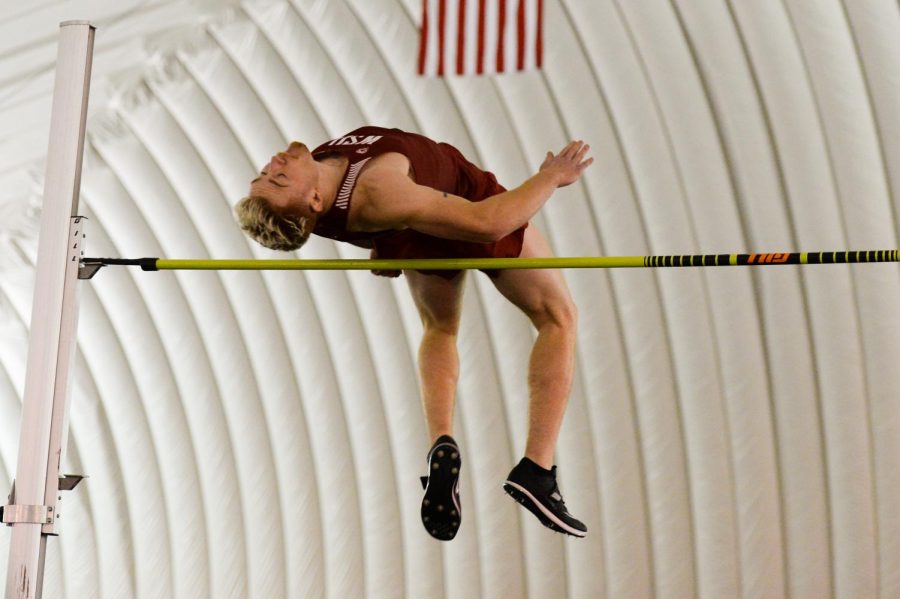 Senior Keelan Halligan clears the bar in the high jump at the WSU Indoor on Jan. 19 at the Indoor Practice Facility.