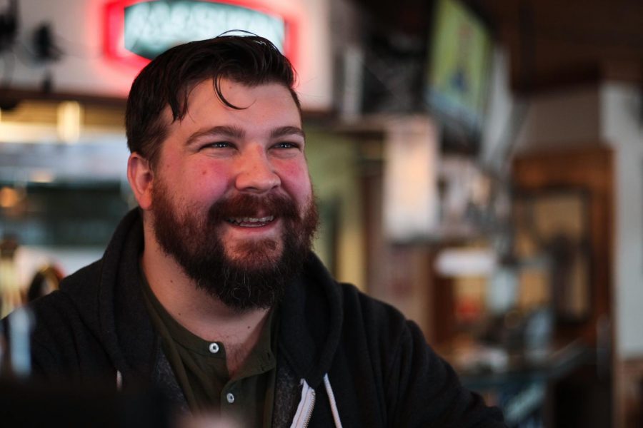 Jake Weigand, manager of Moscow Alehouse, talks the ins and outs of working at a bar in small town and his favorite aspects of the job Feb. 6 in Moscow. Weigand enjoys talking to patrons about travel destinations.