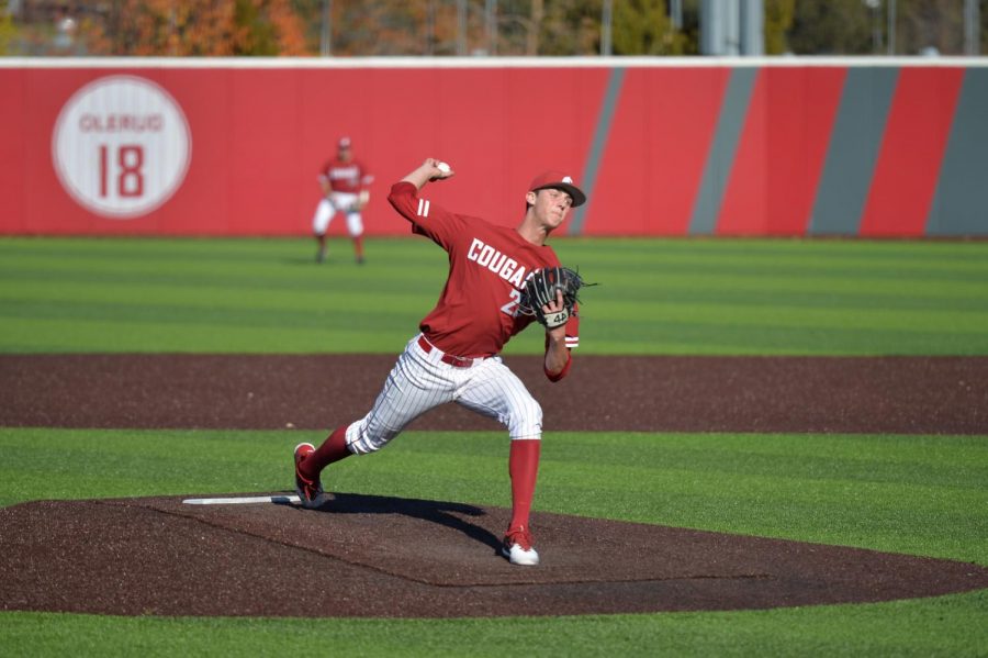 Freshman right-handed pitcher Brandon White winds up to throw the ball in the scrimmage against Gonzaga University on Oct. 21 at Bailey-Brayton Field.
