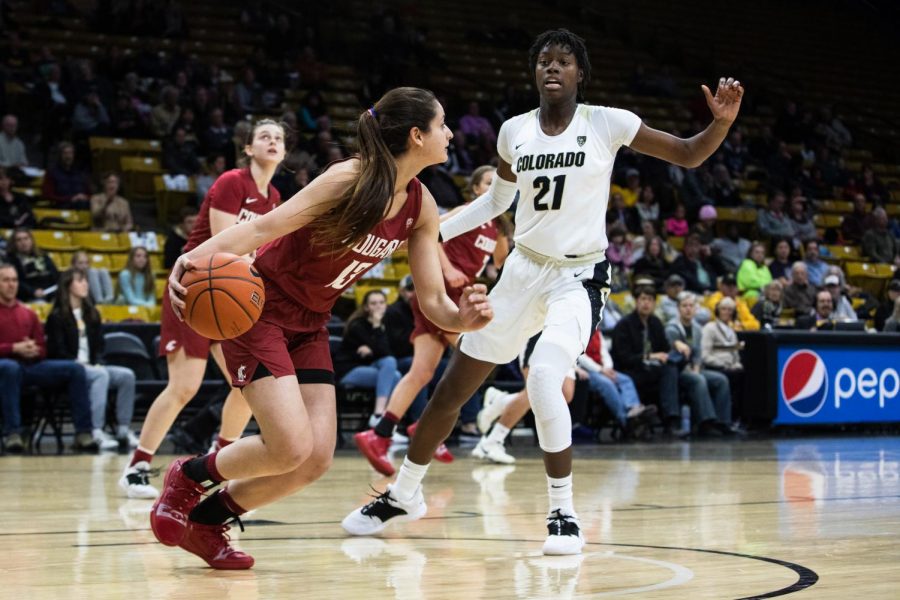 Freshman forward Shir Levy attempts to dribble past a Colorado defender during a game Friday at the CU Events Center in Boulder.