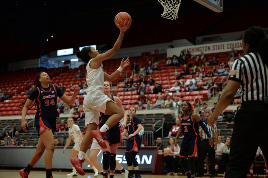 Junior guard Chanelle Molina leaps up towards the basket in the game against Arizona on Saturday at Beasley Coliseum. 