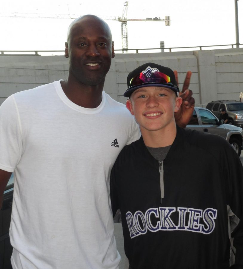LaTroy Hawkins, left, poses for a photo with Kodie in 2014. Hawkins, a former MLB pitcher, said he tries to watch every one of Kodies games and plans on seeing him in person when WSU visits University of Nevada, Las Vegas for a two-game series March 12-13.