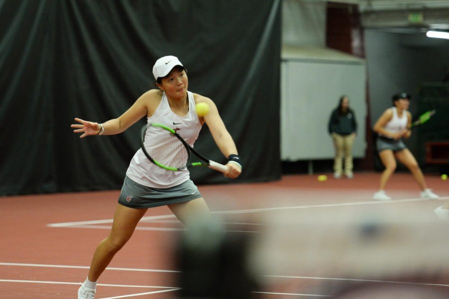 WSU+freshman+Yang+Lee+awaits+a+serve+during+doubles+play+at+match+against+Eastern+Washington+University+Jan.+1+at+Hollingbery+Fieldhouse.+Yang+and+her+Teammate%2C+Junior+Melisa+Ates%2C+defeated+EWU+6-2.
