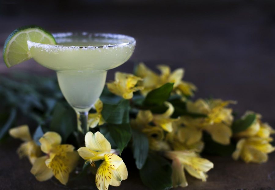 Celebrate National Margarita Day and other alcoholic events with a tasty margarita. Combine tequila, orange liqueur and lime and shake well. Add chili to spice up your drink. 