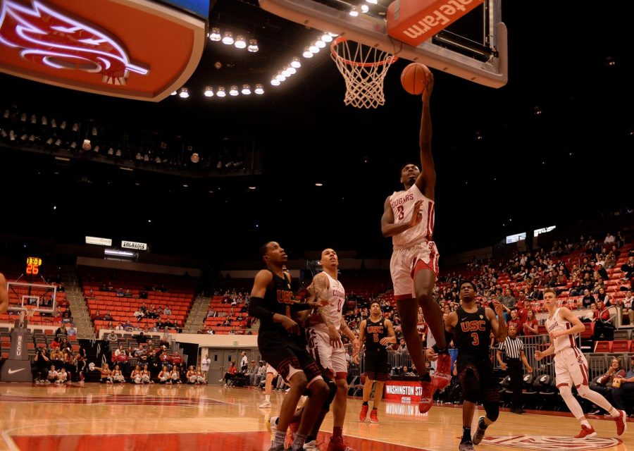 Senior forward Robert Franks goes in for a layup, scoring two points during the game against USC on Saturday evening at Beasley Coliseum. WSU lost 93-84.