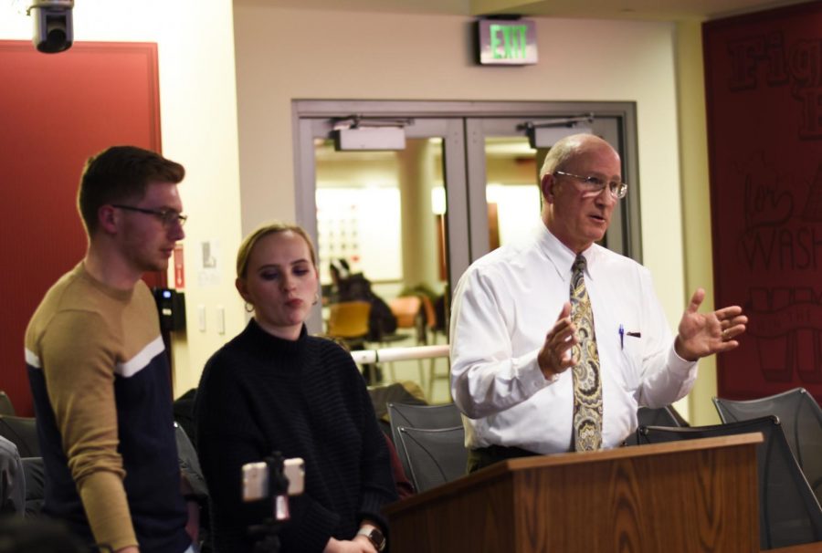 Matthew Winchell, left and Savannah Rogers, center, represent the Transportation Advisory Group (TAG) as Director of WSU
Transportation Services John Shaheen delivers a student transit fee proposal to ASWSU Wednesday night at the CUB.
