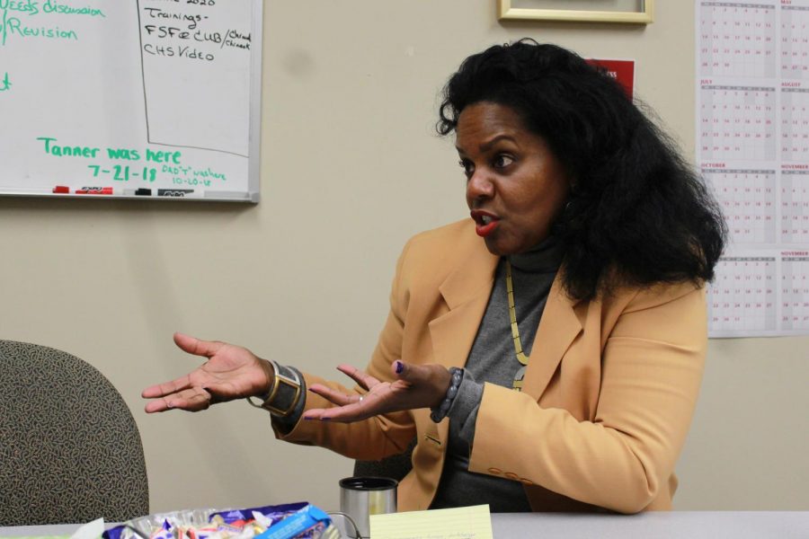 Renee Coleman-Mitchell, executive director of Cougar Health Services, talks about leaving her current position Tuesday morning at the Access Center.