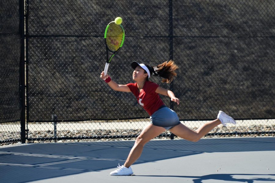 Then-freshman+Savanna+Ly-Nguyen+reaches+out+to+return+the+ball+during+her+singles+match+against+Arizona+on+Sunday+at+the+WSU+Outdoor+Tennis+Courts.+The+contest+resulted+in+a+6-1+win+for+the+Cougars.