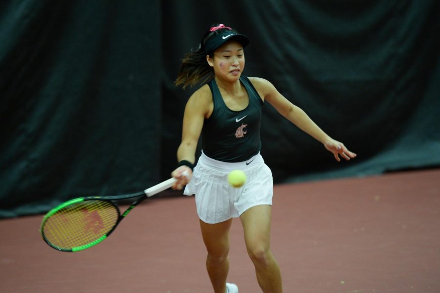 Freshman+Savanna+Ly-Nguyen+returns+a+ball+during+singles+play+against+Seattle+on+Feb.+22+in+Hollingbery+Fieldhouse.