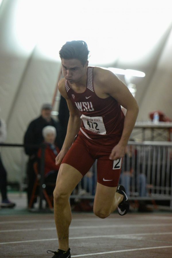 Freshman Matthew Howard explodes out of the blocks in the 400 meter dash during the WSU Indoor on Jan. 19 at the Indoor Practice Facility.  Howard finished fourth with a time of 52.31 in the event.