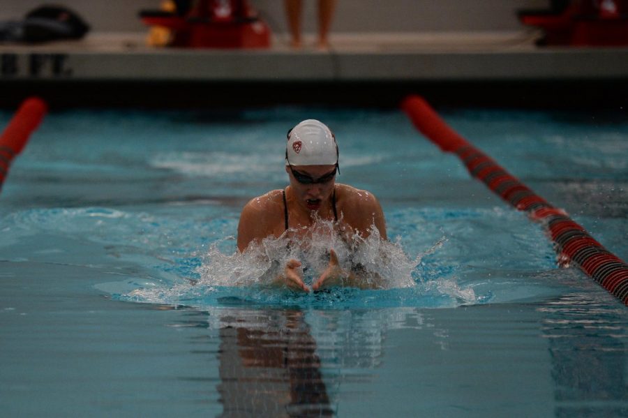 Senior+breaststroke+swimmer+Linnea+Lindberg+swims+in+a+meet+against+Utah+on+Feb.+16+in+Gibb+Pool.+Lindberg+finished+third+in+her+heat+with+a+time+of+1%3A04.31.
