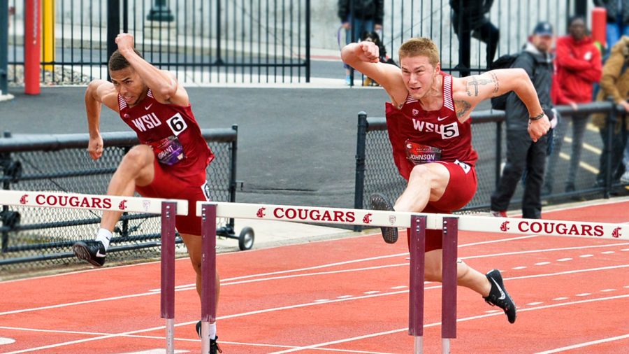 Then-junior Christapherson Grant, left, and then-sophomore Nick Johnson prepare to jump over hurdles during the WSU-UW Dual meet on April 28, 2018 at Mooberry Track. 