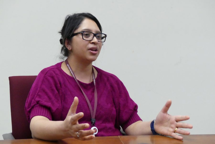 Swechha Pokharel, a co-researcher and graduate student, speaks about a new way cells become inflamed that was previously unknown Monday at Bustad Hall. 
