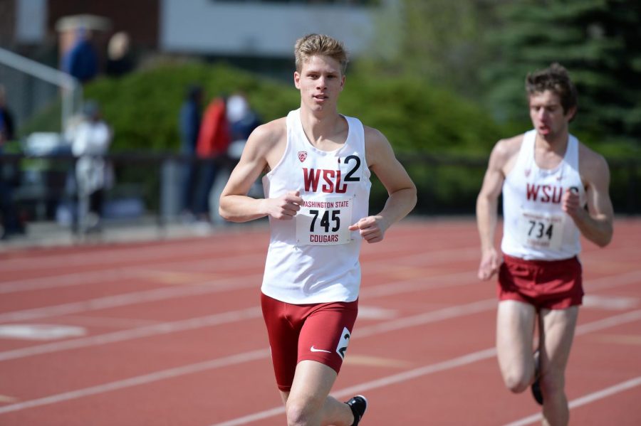 Sophomore Matthew Watkins, left, and redshirt sophomore Zak Kindl compete in the men's 5,000 meter Saturday afternoon at Mooberry Track. 