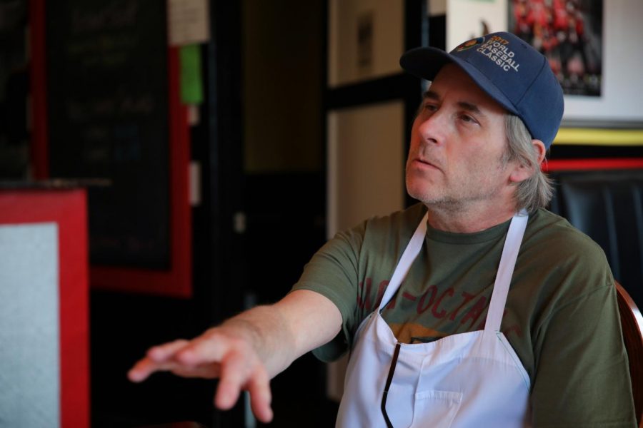 Owner Jonathon McCabe shares his vision for the future of Heros N Sports on Monday at the shop. He said its paninis and attitude make it unique to Pullman.