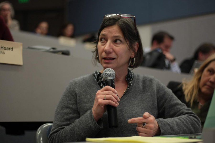 Pamela Thoma, senator for the College of Arts and Sciences, raises concerns about a proposed change to the faculty manual that could affect faculty promotions and tenure tracks Thursday in the Food Science and Human Nutrition building.