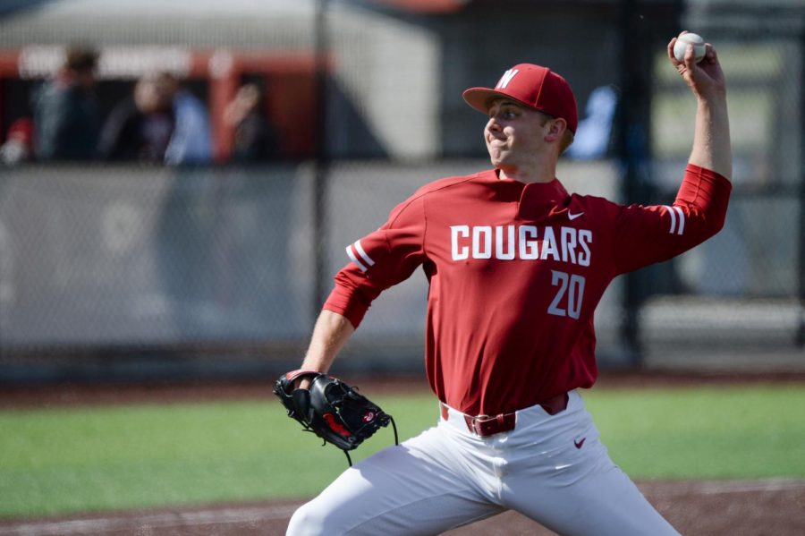 Junior left-handed pitcher AJ Block throws a pitch during the game against No. 2 Stanford on Saturday 
afternoon at Bailey-Brayton Field. The Cougars lost the game 8-5.