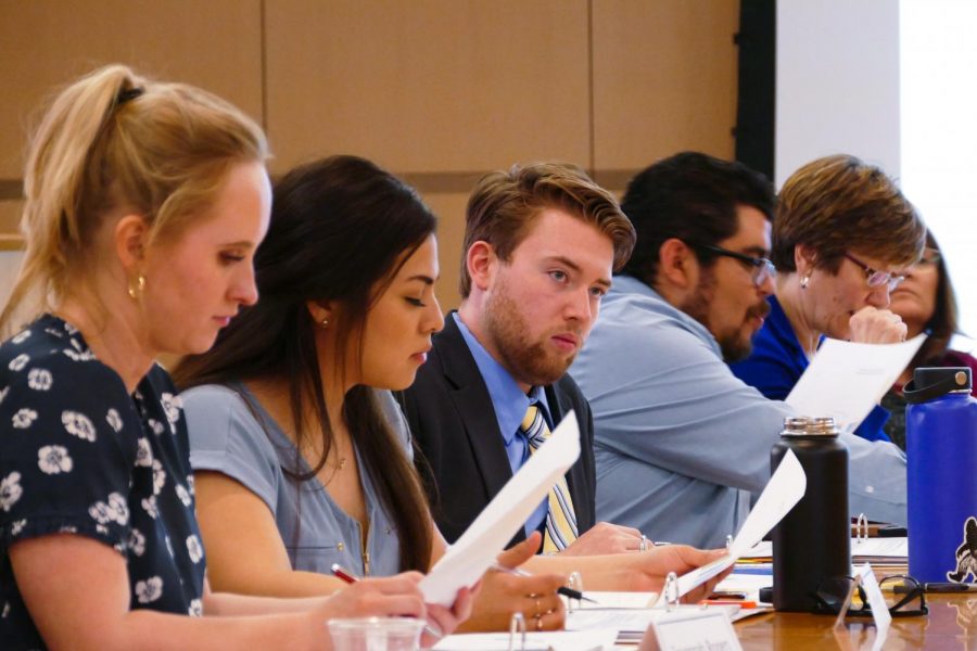 WSU S&A Board members Savannah Rogers, left, Debbie Majano, Tyler Parchem and Rick Flores listen to proposals during the WSU S&A Budget meeting on Wednesday night.