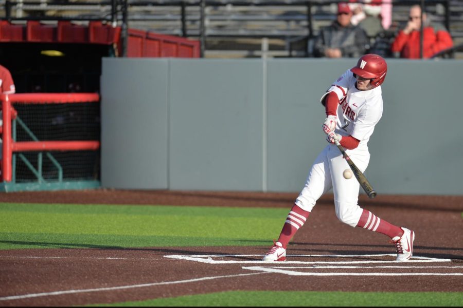 Junior+outfielder+Danny+Sinatro+makes+contact+with+the+ball+in+the+bottom+of+the+second+inning+in+the+game+against+Stanford+on+Mar.+29+at+Bailey-Brayton+Field.+Sinatros+at+bat+resulted+in+a+double+play.