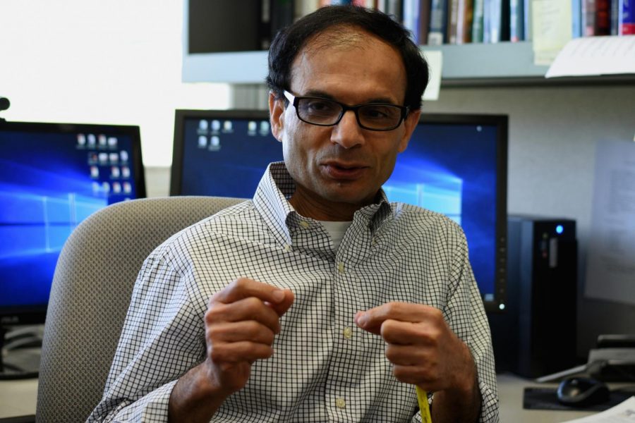 Professor of biological systems engineering Shyam Sablani discusses a new spoiled milk detector May 8 in the LJ Smith Building. These detectors will change color so that consumers can tell when the milk spoils.