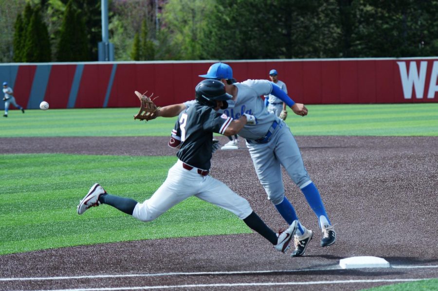 Senior shortstop Andres Alvarez runs towards first, where he was called safe at the top of the eighth inning Sunday afternoon at Bailey-Brayton Field. Junior center fielder Danny Sinatro advanced to second base, putting a WSU runner in scoring position.