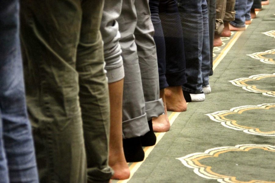 Muslim and non-Muslim community members in Pullman gather for the Evening Prayer, known as the Maghrib prayer, at the Pullman Islamic Center on Saturday. The event included a dinner where Ramadan participants broke their fast at sundown in celebration.