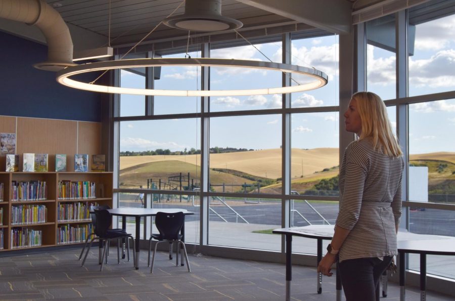 Shannon Focht, Pullman Public Schools communications director, showcases Kamiak Elementary School’s library on Thursday. The new school has 24 classrooms, as well as an English Language Learners area and a Developmental Learning Center.
