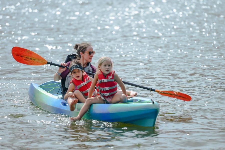 Visiting scientist at WSU Renee Petipas, her daughter Liliah Elrouby, 6, and Hayden Bystrom, 6, kayak during the Palouse Outdoor Festival on Saturday at Wawawai County Park.