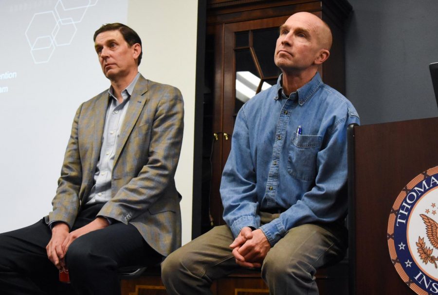 John Roll, Professor and Vice Dean for Research at WSU’s Elson S.Floyd College of Medicine in Spokane, left, and Bob Lutz, Health Officer for the Spokane Regional Health District, answer questions after their combined presentation on drug addiction on Tuesday at noon in the Foley Talk room at Bryan Hall.
