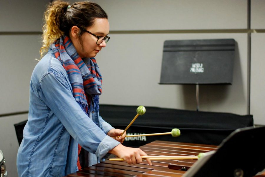 Meg Tolley, a master’s student planning to become a music teacher, plays Cameleon by Eric Summut on the marimba.