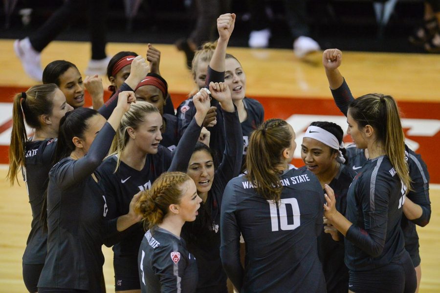 The+womens+volleyball+team+celebrates+after+a+win+against+UT+Arlington+on+Sept.+13+at+Bohler+Gym.