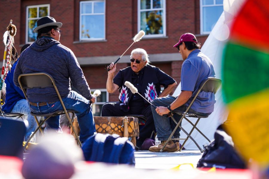 Retired local Michael J. Penny performs with other indigenous members during the Indigenous Peoples Day festivities on Oct. 14 on the steps of Todd Hall.