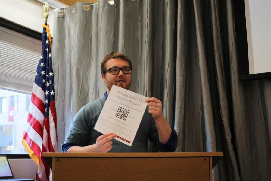 Brian Stack, Ph.D. candidate in the WSU history department, talks about the Palouse LGBTQ History Project Thursday at the Neill Public Library.