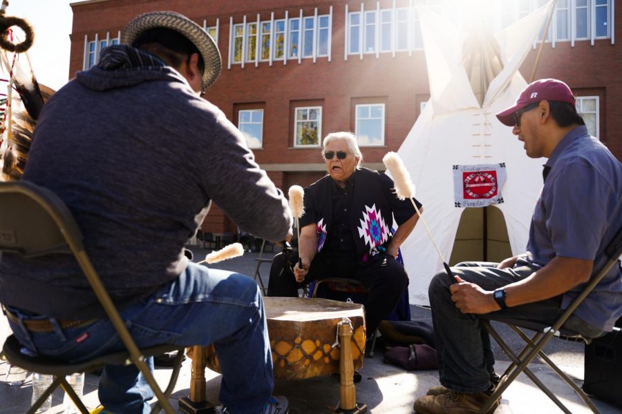 Michael J. Penny, retired local, performs during the Indigenous Peoples Day Festivities Monday afternoon on the Todd steps. 