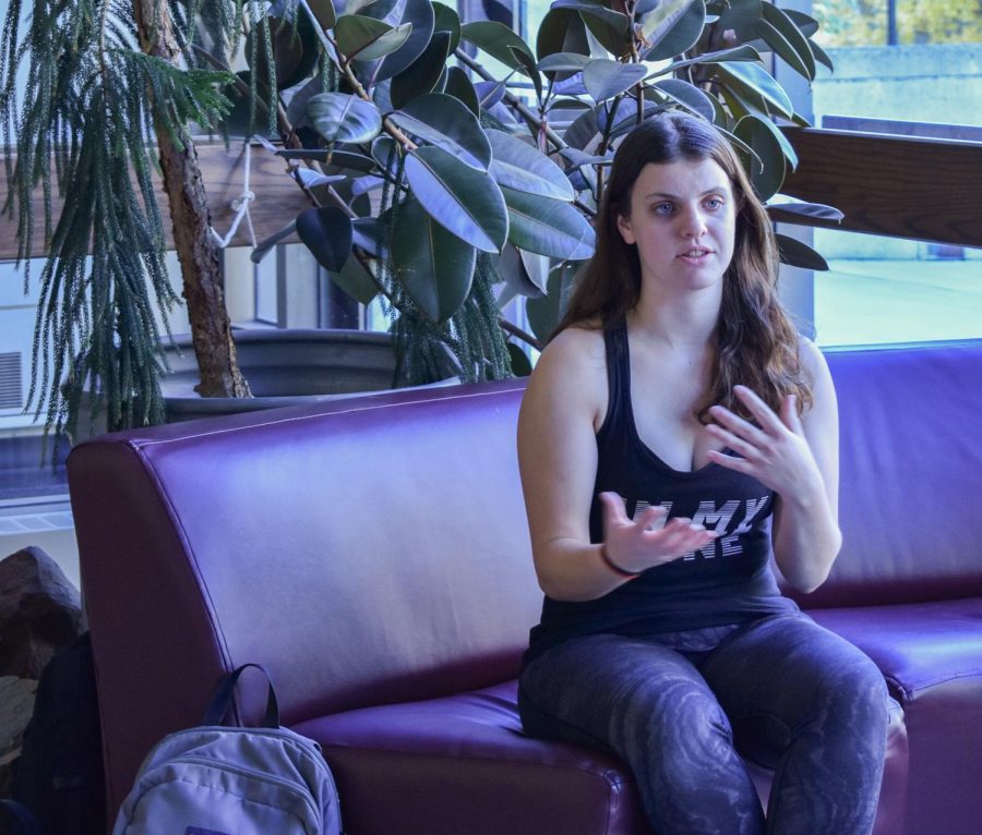 Danielle Keerbs, president of the WSU Aerial Dance Society, talks about  what the club does and how others can get involved on Monday in the lobby of the Webster Physical Sciences Building.