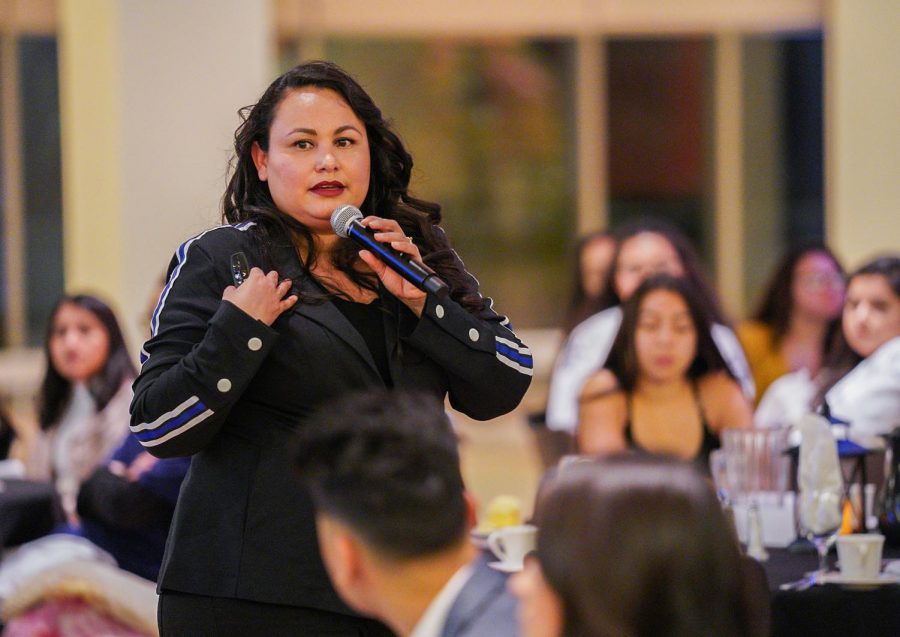 Karla Blanco, assistant professor and clinician at the University of Idaho asks students to share their thoughts on the high rate of Latinos committing suicide at the CUB Senior Ballroom.