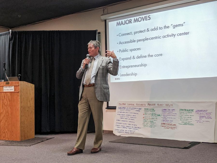 Brian Douglas Scott, principal of BDS Planning & Urban Design, explains the components of the master plan aimed at renovating the downtown area businesses to attendees during a meeting at the Gladish Community and Cultural Center.