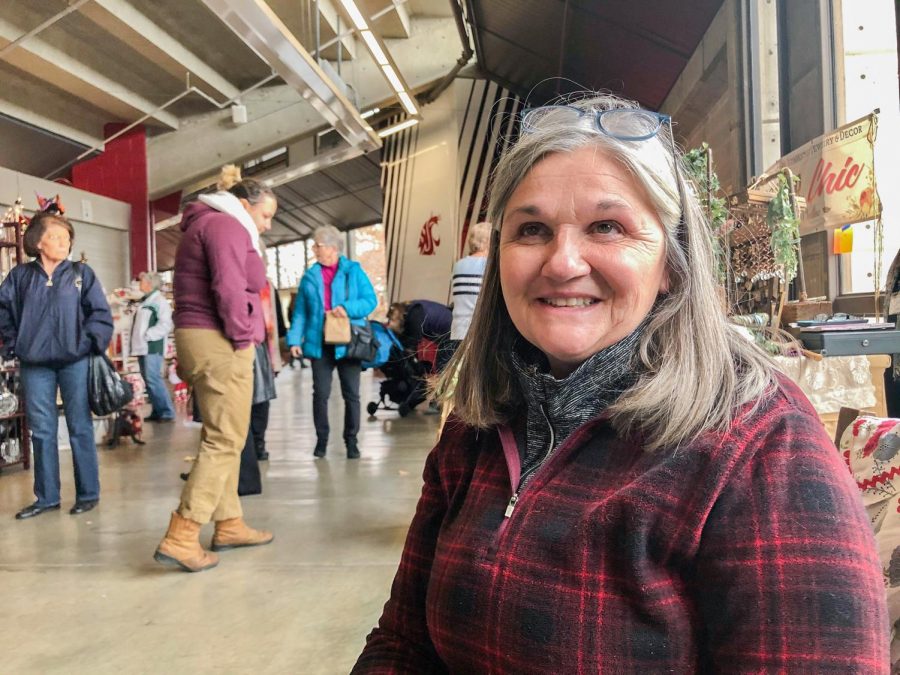 Carrie Edwards, a Colfax local, presents her flowers and flower arrangements at the Fall 2019 Vintage and Handcraft Fair on 
Saturday morning at the Beasley Coliseum.
