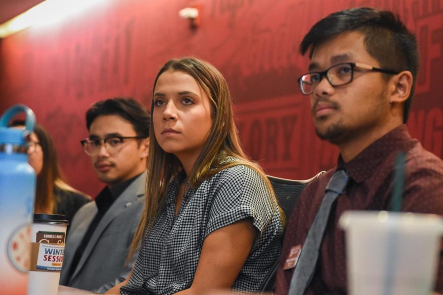 ASWSU senators Malvin Malai-Harrison, left, Melissa Torres, middle, and Donavyn Velez-Fucal listen during the meeting on Wednesday at the CUB. The Senate discussed how Utah filed a motion to dismiss the McCluskey lawsuit. 