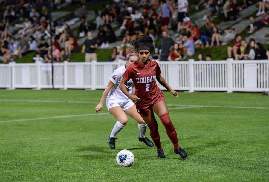 Freshman defender Rose Young dribbles the ball against Montana on Aug. 30 at the Lower Soccer Field.